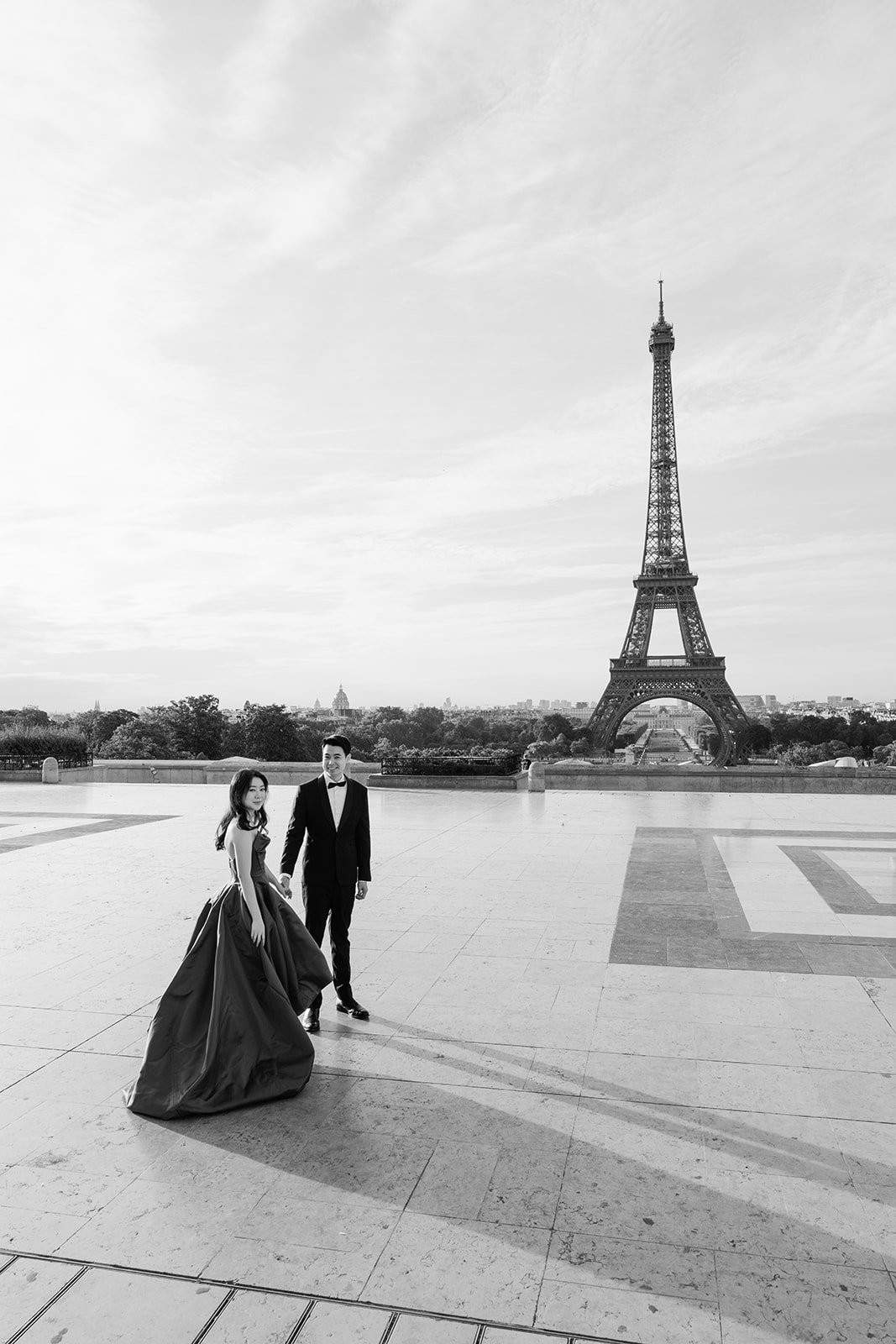 American couple photographed at the Eiffel Tower during a Paris couple session