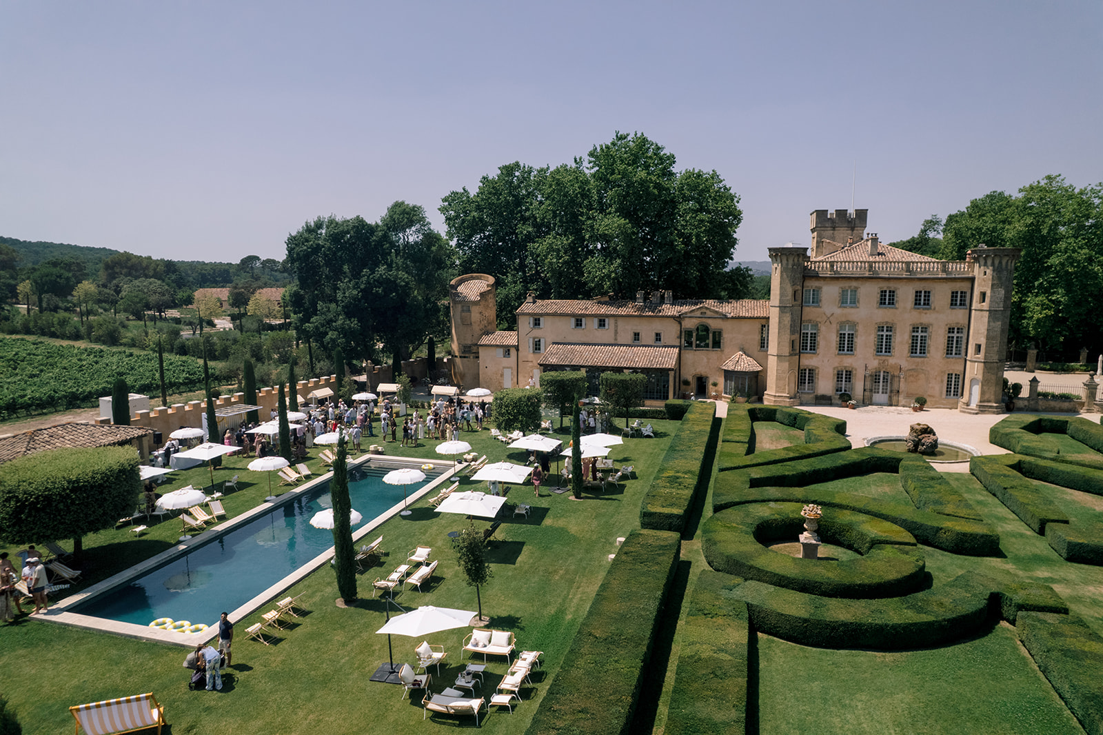 DJ performing during a wedding pool party in the South of France