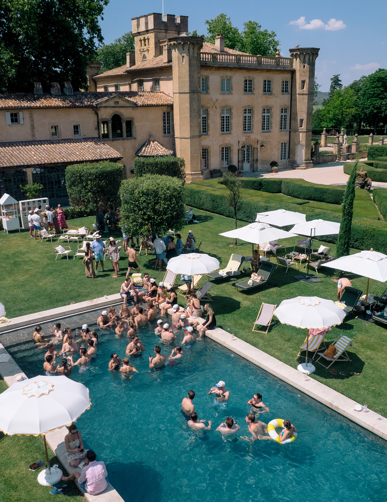 Destination wedding pool party at a private estate in Provence, France
