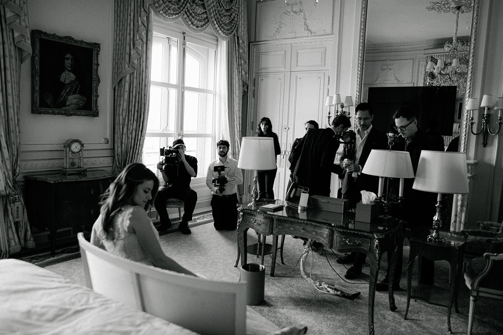 Behind-the-scenes bridal preparation in an ornate Ritz Paris suite