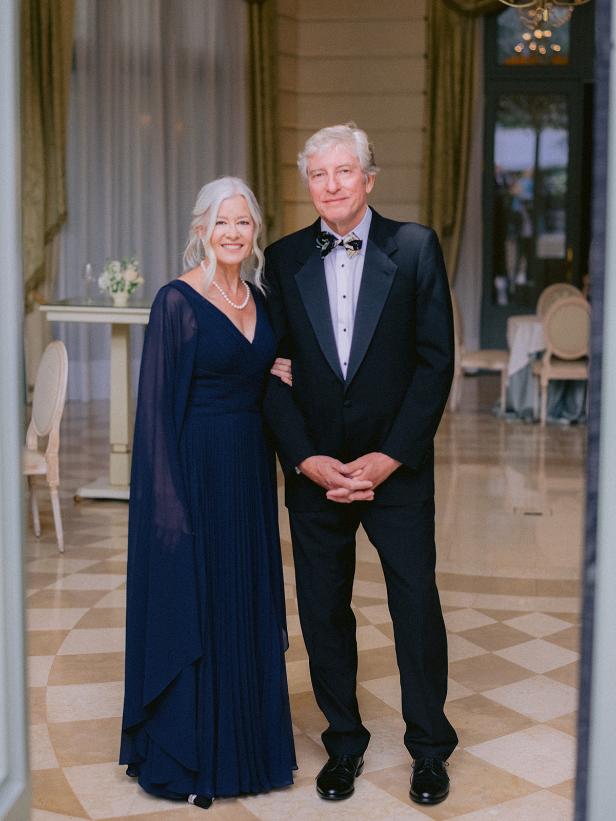 Elegant family portrait in black tie at a luxury Paris wedding
