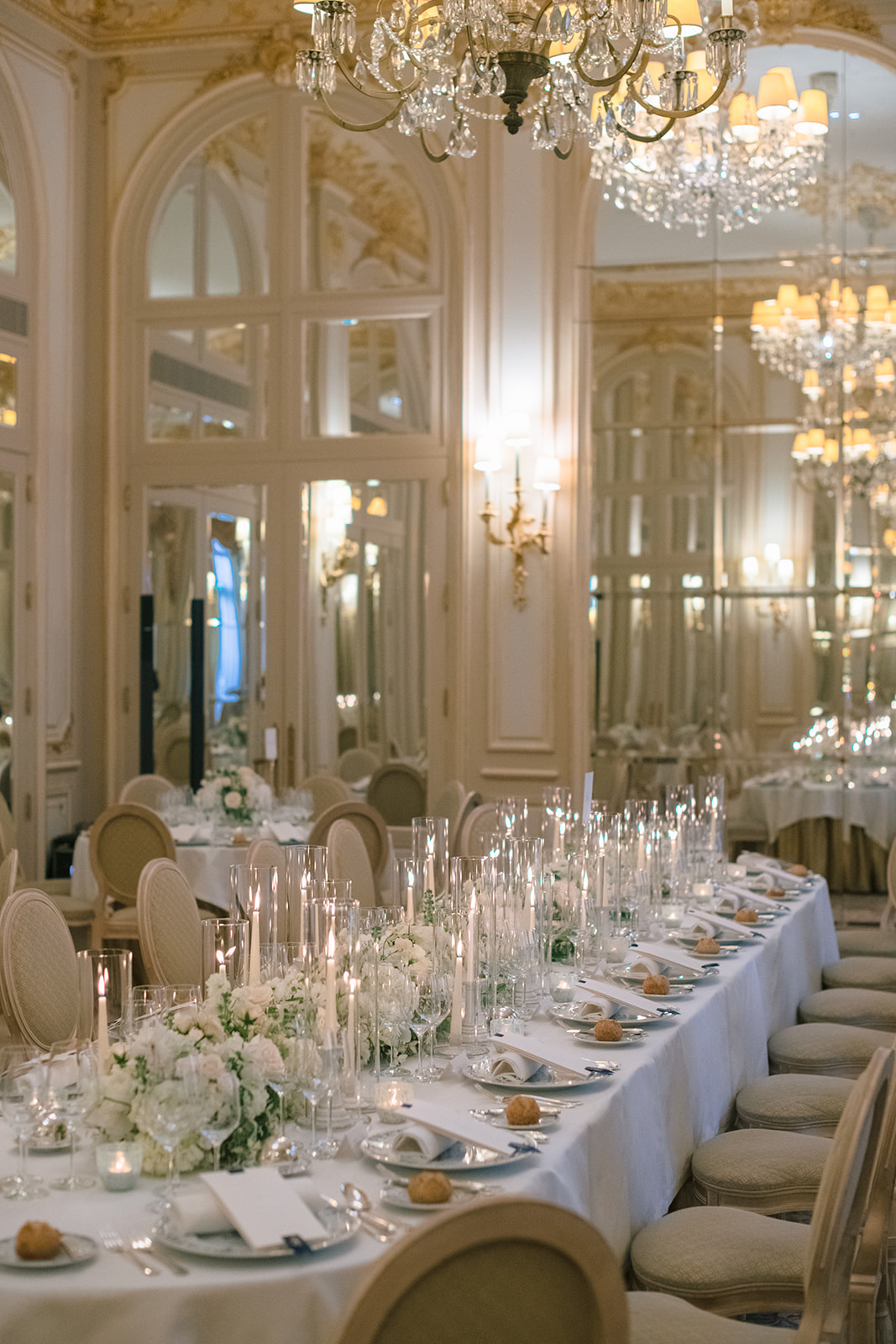 Ritz Paris ballroom arranged for an elegant wedding dinner