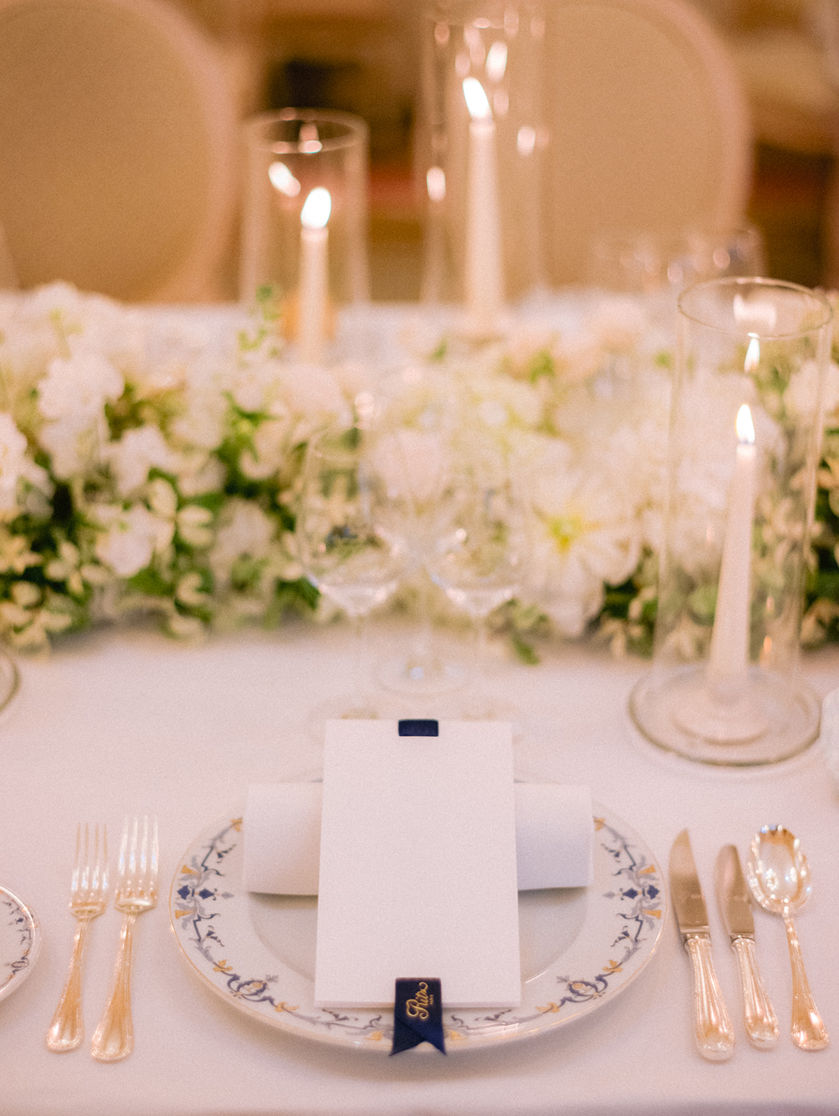 Candlelit wedding table with white floral design