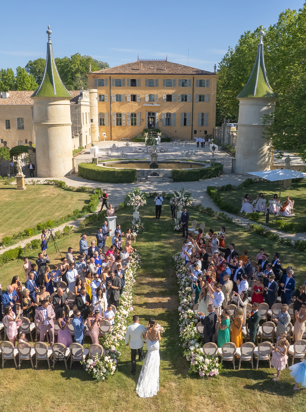 Aerial view of an outdoor wedding ceremony at Château de Fonscolombe in Provence