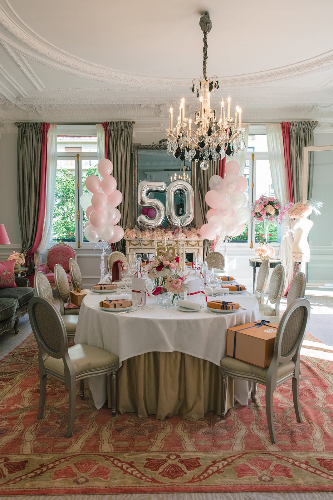 Private 50th birthday event set inside a suite at Hôtel Plaza Athénée Paris
