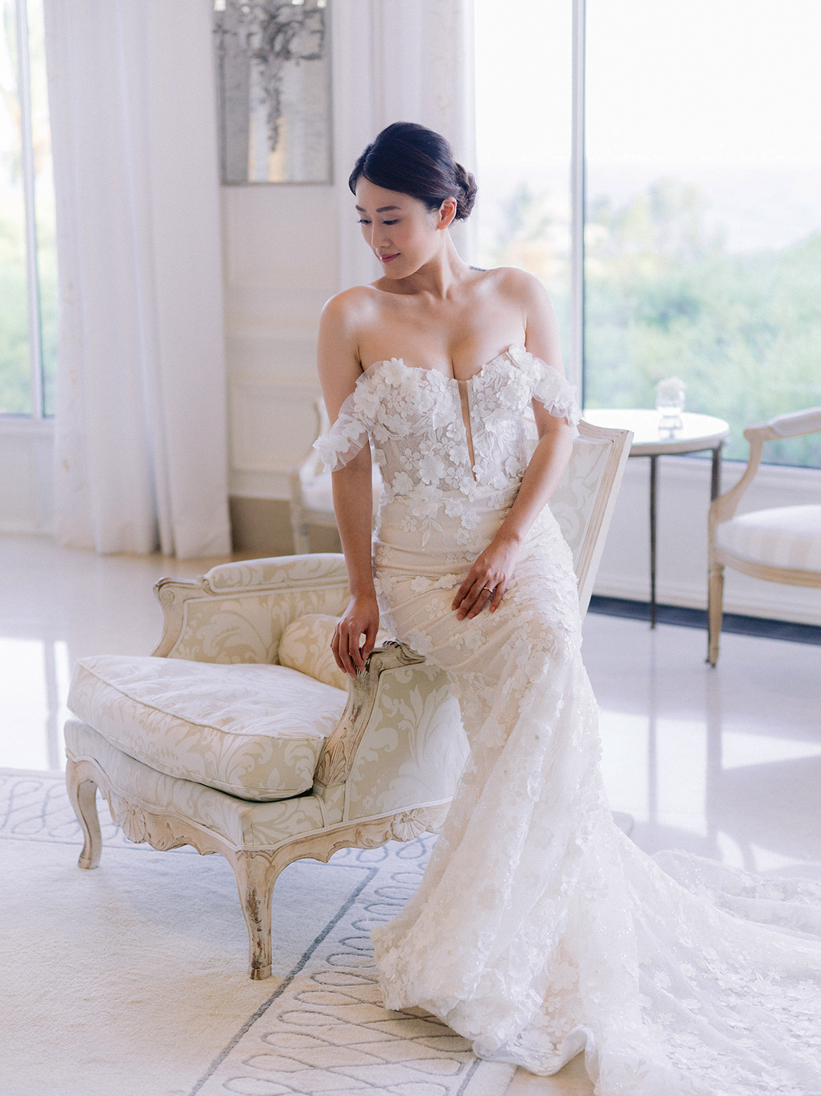 Editorial bridal portrait inside a bright suite at Grand-Hôtel du Cap-Ferrat