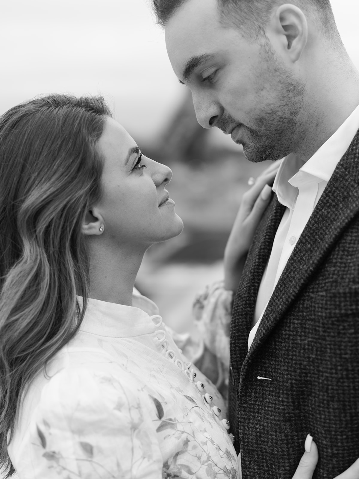 Intimate black-and-white close-up during an Eiffel Tower couple photoshoot