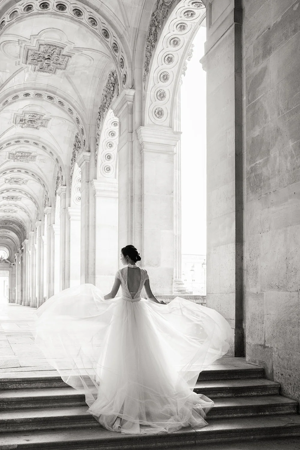 Bride in an Ersa Atelier dress during a Paris pre-wedding session