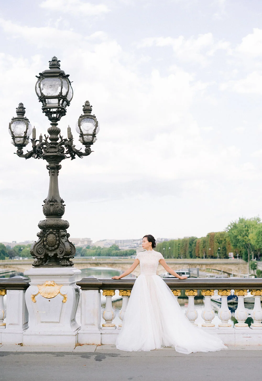 Bride photographed on Pont Alexandre III in Paris