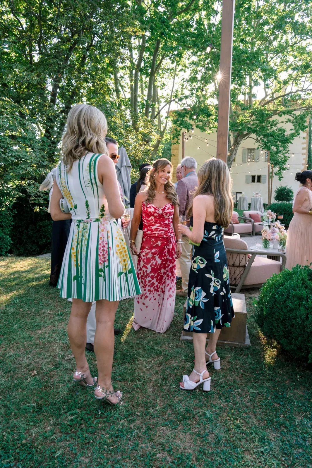 Guests gathering in the garden for the Day 2 welcome dinner at Château de la Gaude