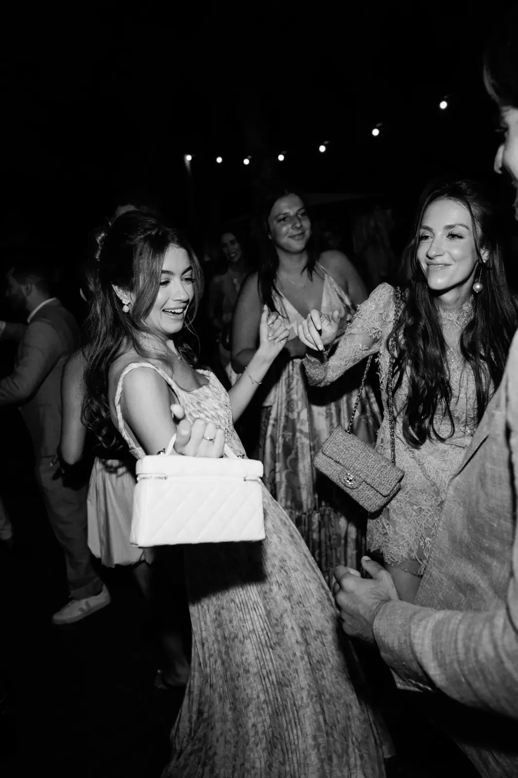 Guests dancing at night during the Day 2 welcome dinner at Château de la Gaude