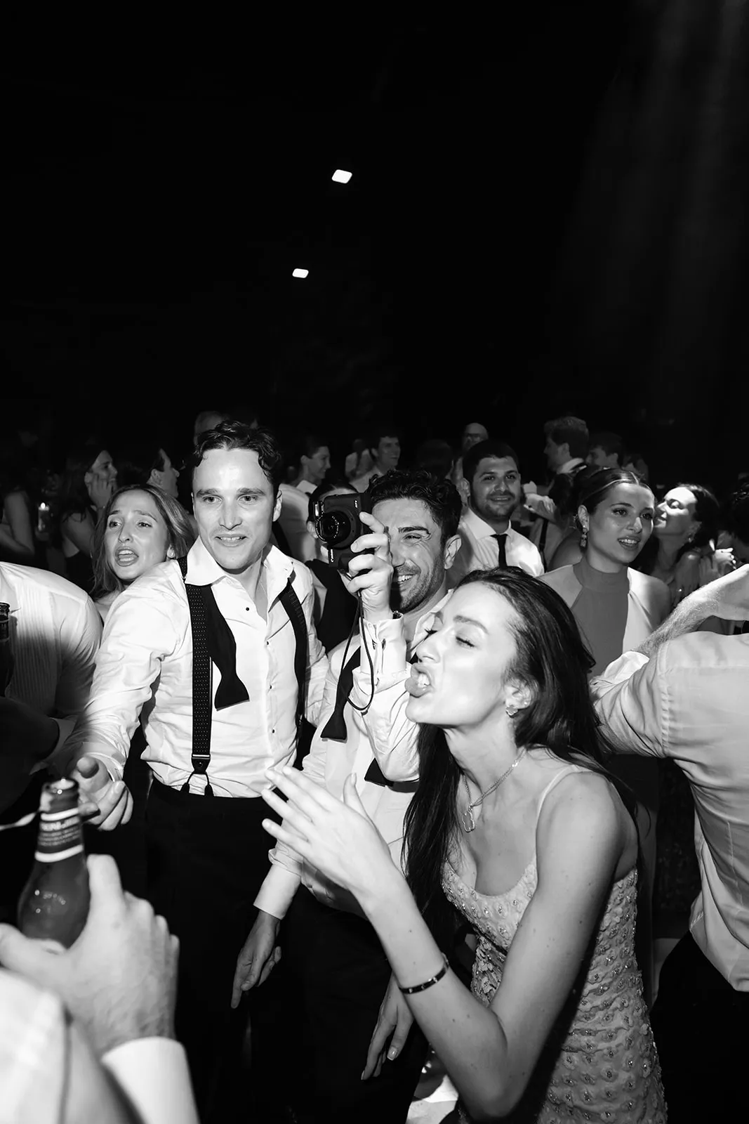 Energetic black and white moment on the Villa Baulieu wedding dance floor