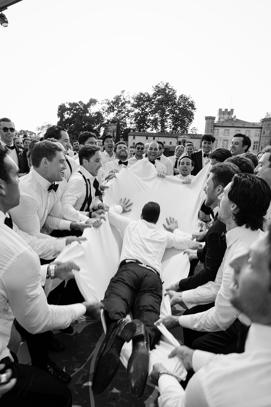 Groom crowd surfing during the hora at Villa Baulieu