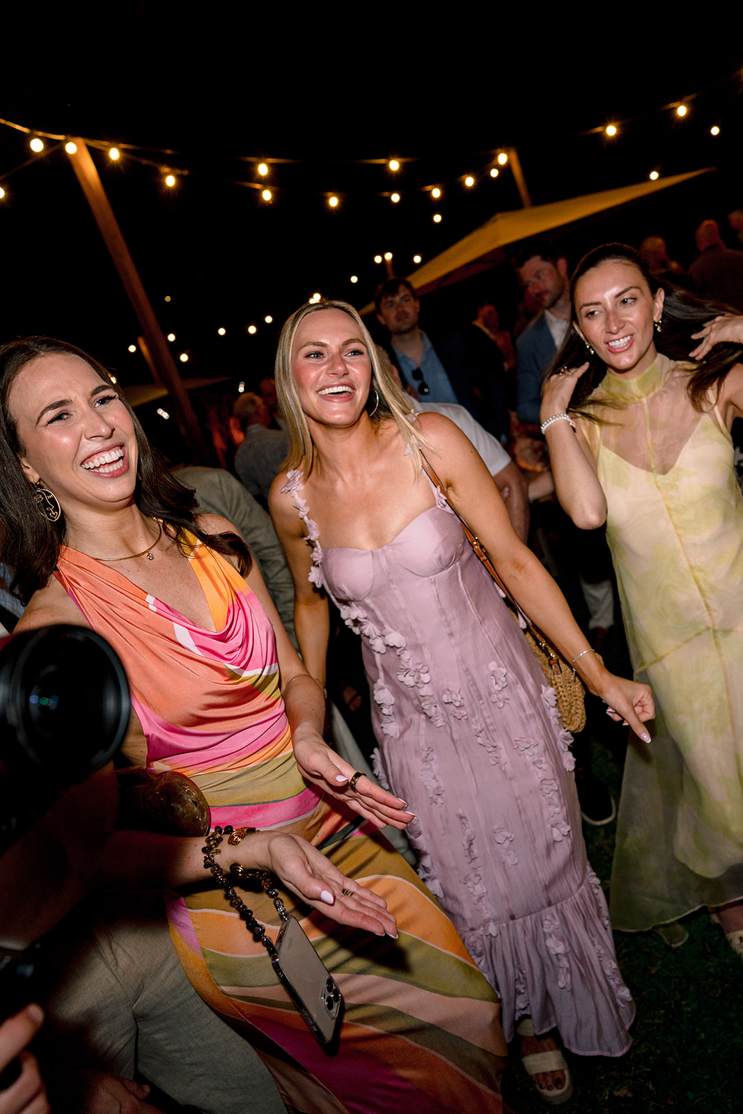 Wedding guests dancing during the evening party at Villa Baulieu