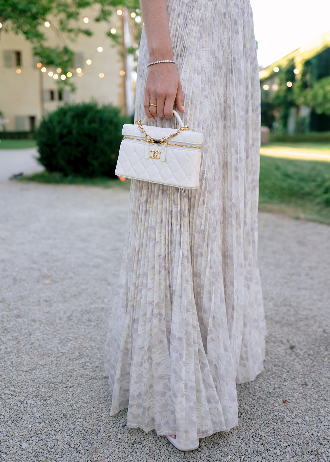 Chanel handbag and bridal fashion detail at Villa Baulieu