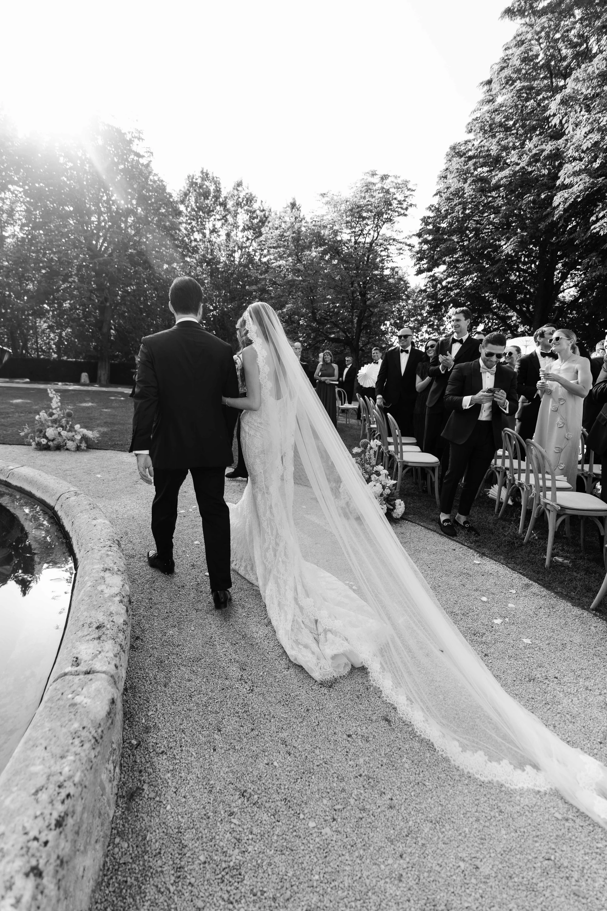 Bride and groom leaving their wedding ceremony at Villa Baulieu