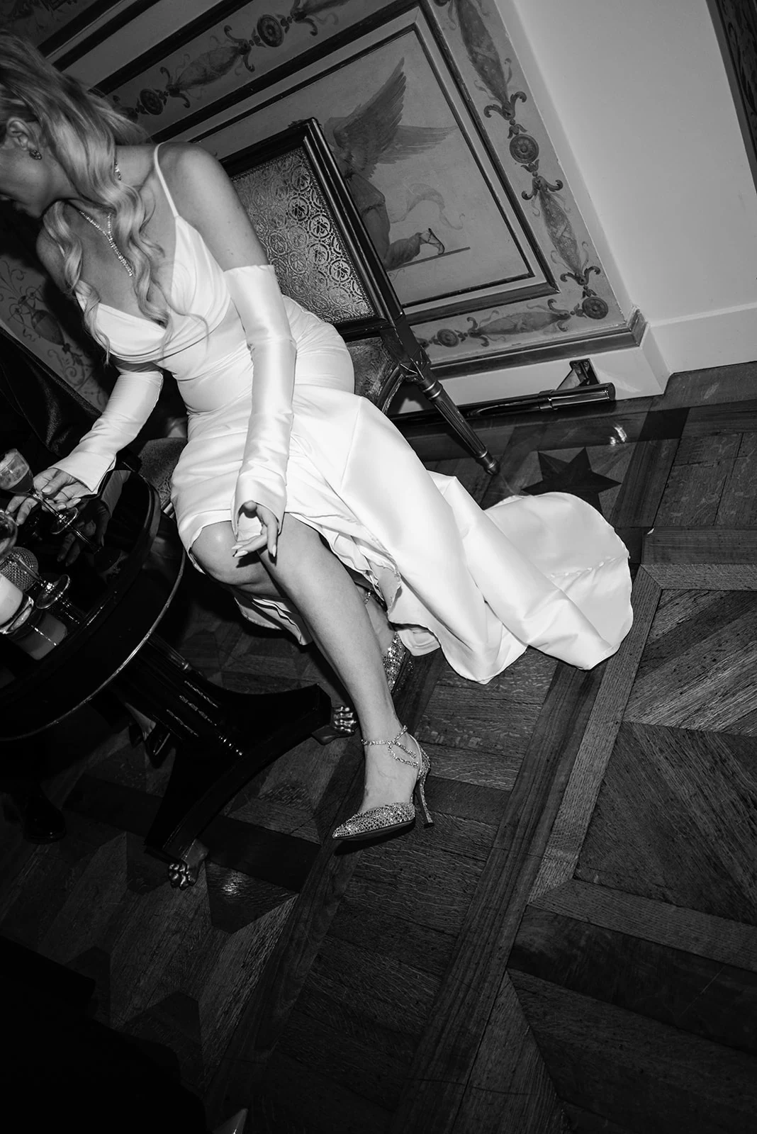 Bride and groom seated together during their wedding reception at Shangri-La Paris