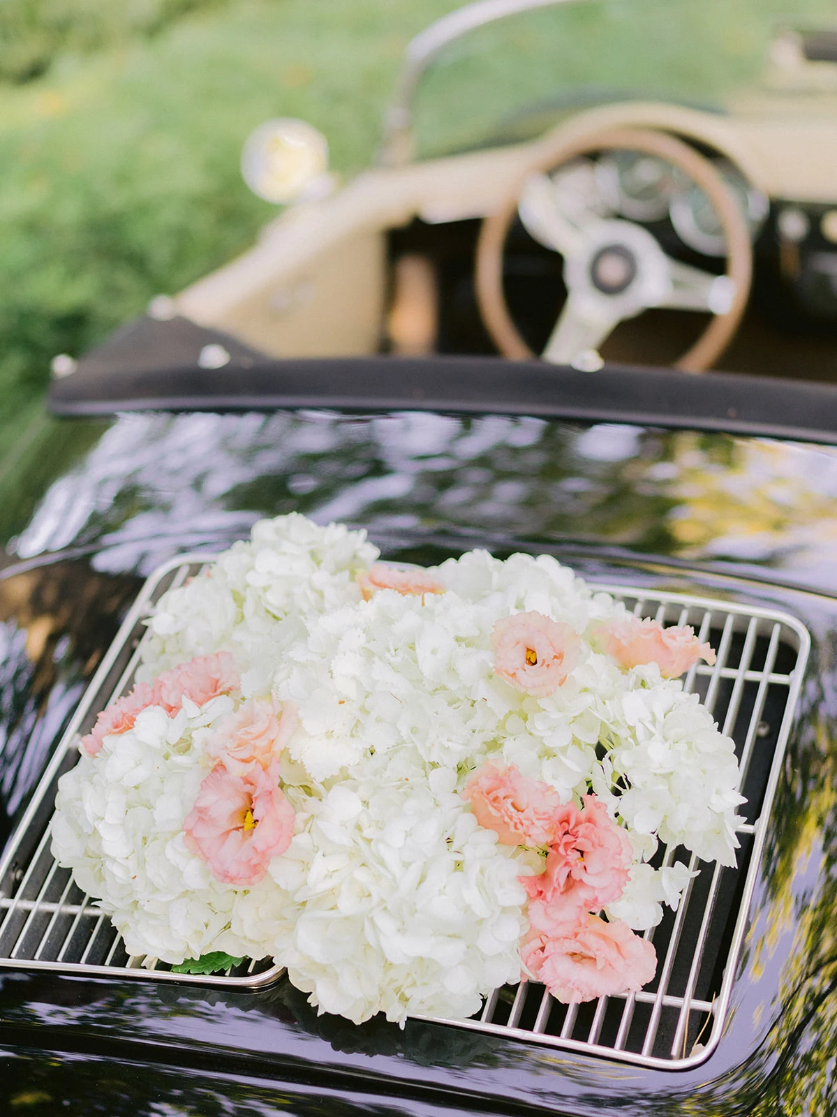 Floral decoration on a classic wedding car in Provence