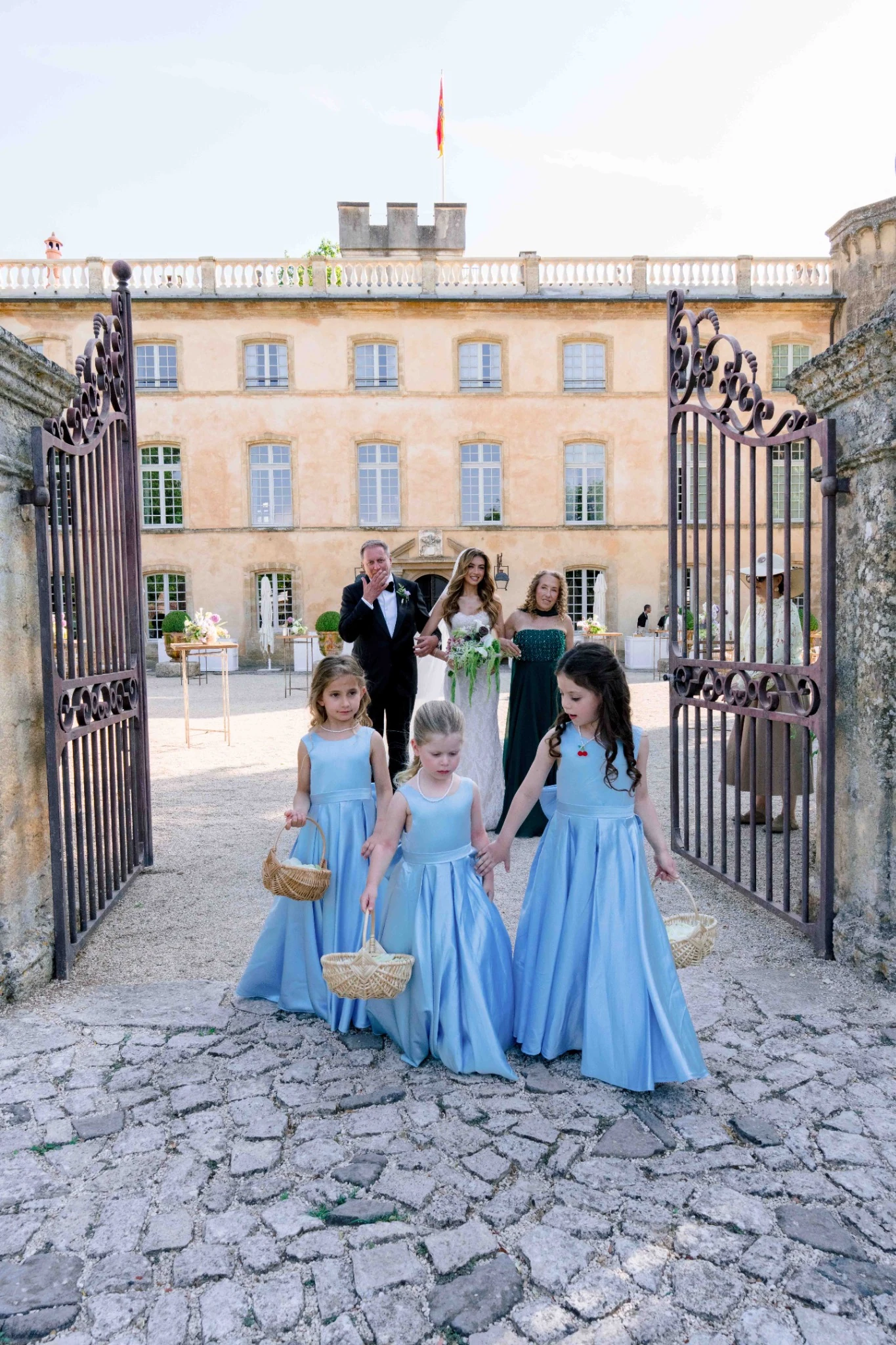 Flower girls entering a wedding ceremony in Provence