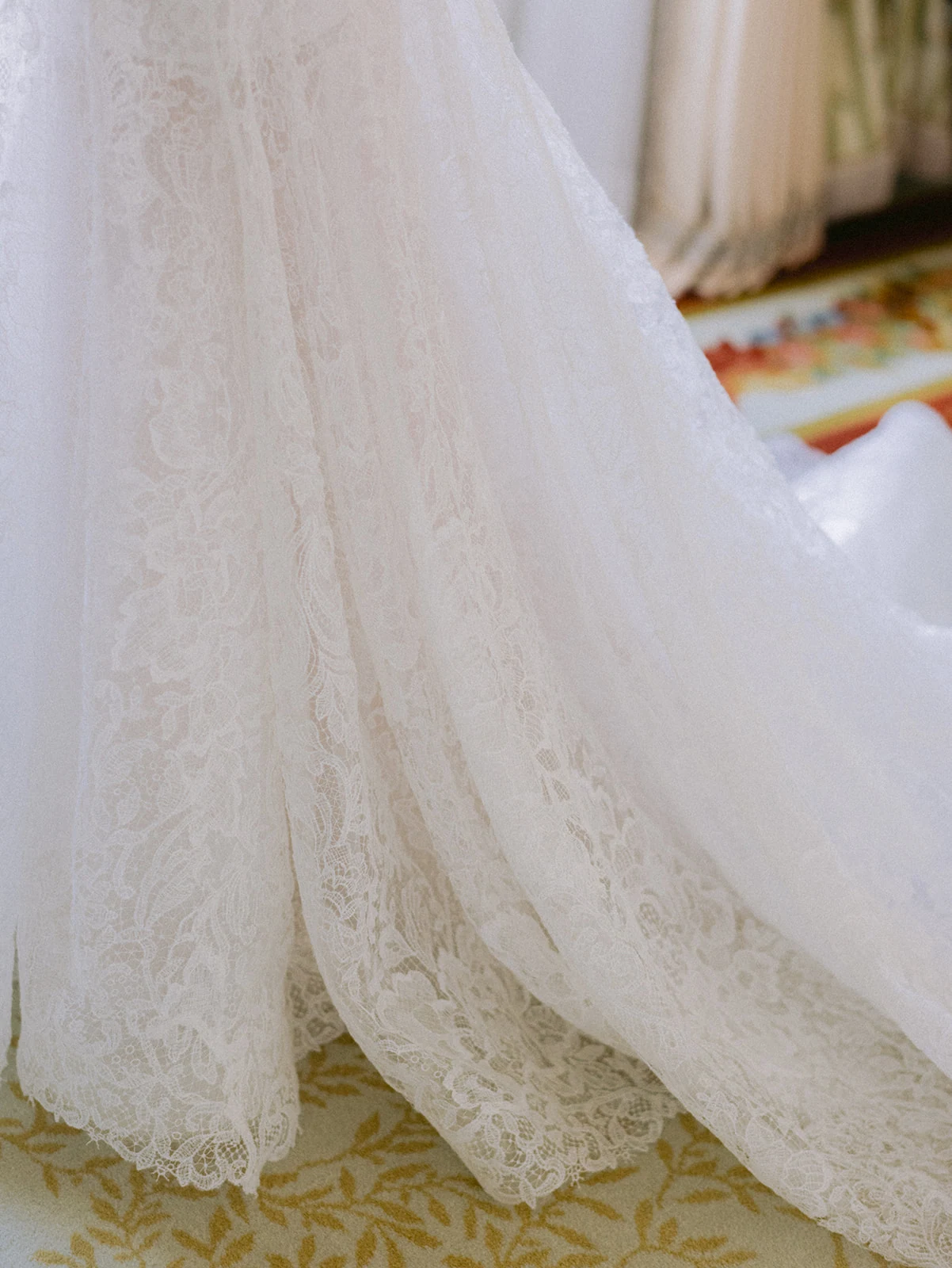 Fine lace detail of an editorial bridal gown in Paris