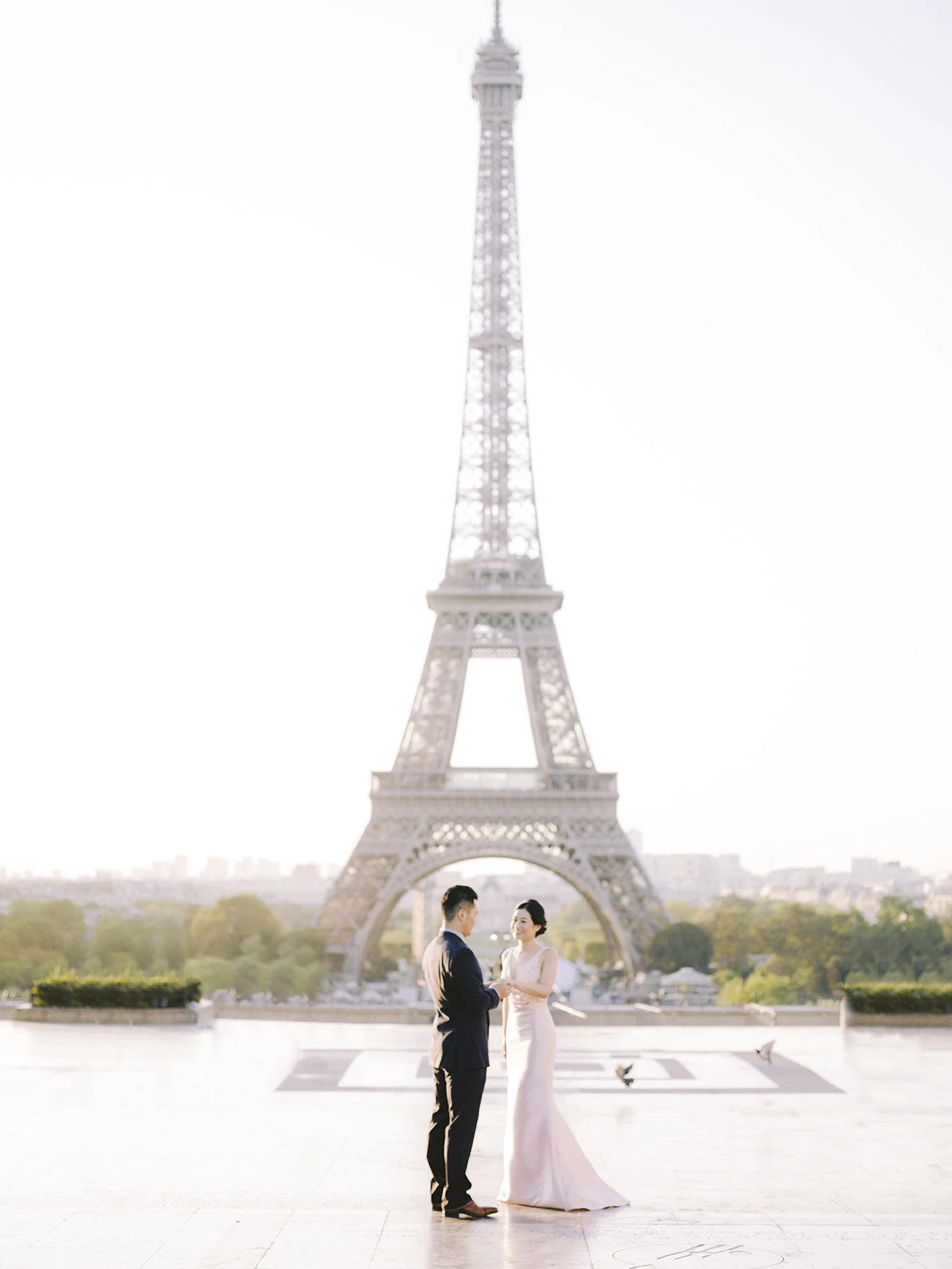 Couple photographed during a Paris photoshoot near the Eiffel Tower