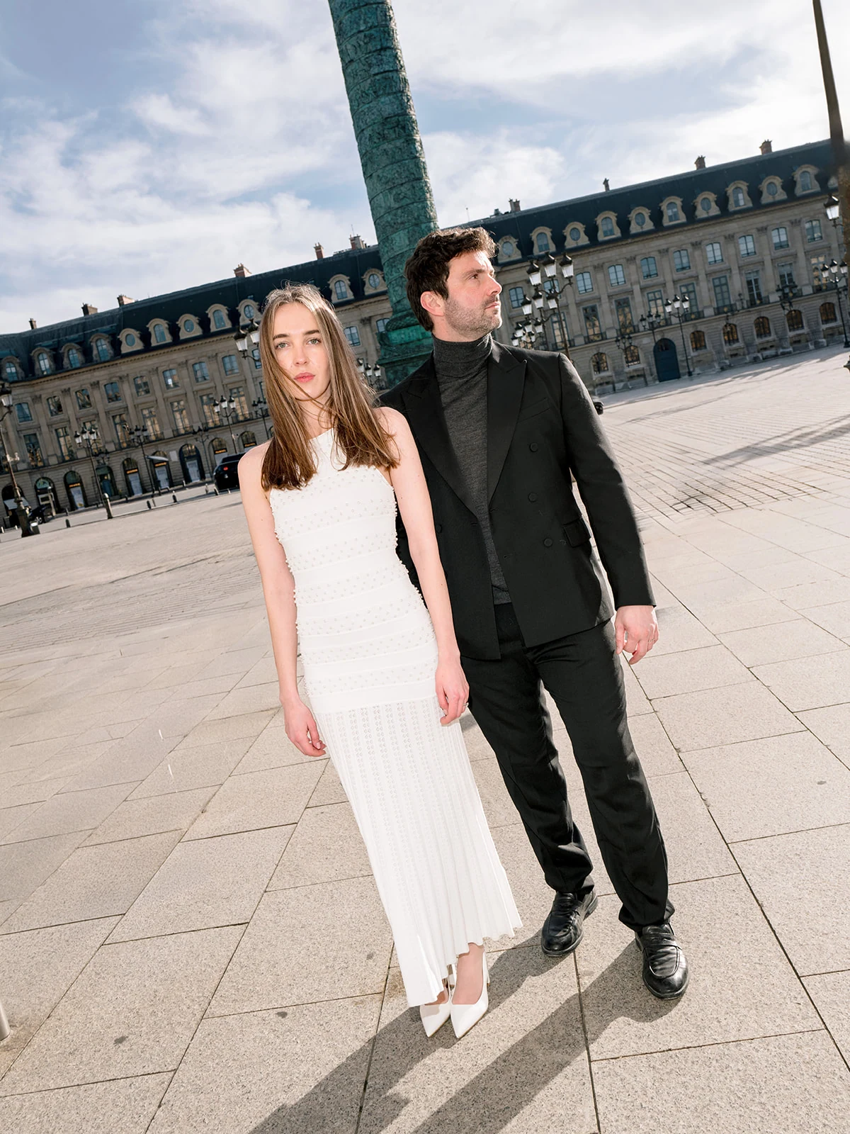 Fashion-forward editorial couple portrait on Place Vendôme in Paris