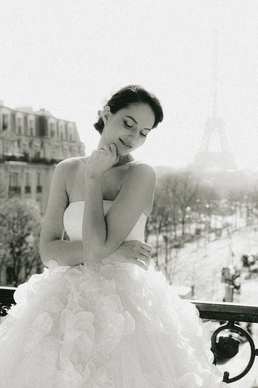 Soft bridal portrait overlooking the Eiffel Tower from Plaza Athénée