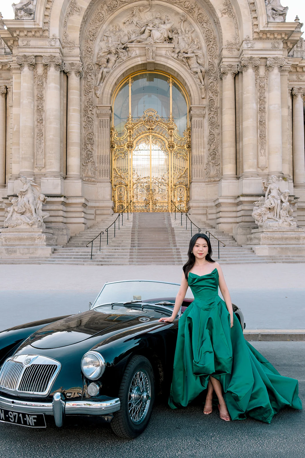 Editorial bridal portrait with a vintage convertible at Petit Palais