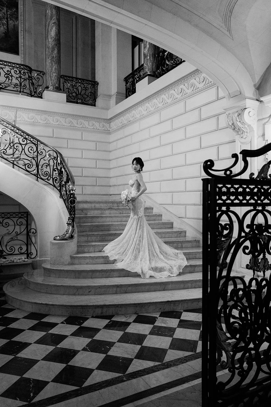 Bride posing on the iconic grand staircase at Shangri-La Paris