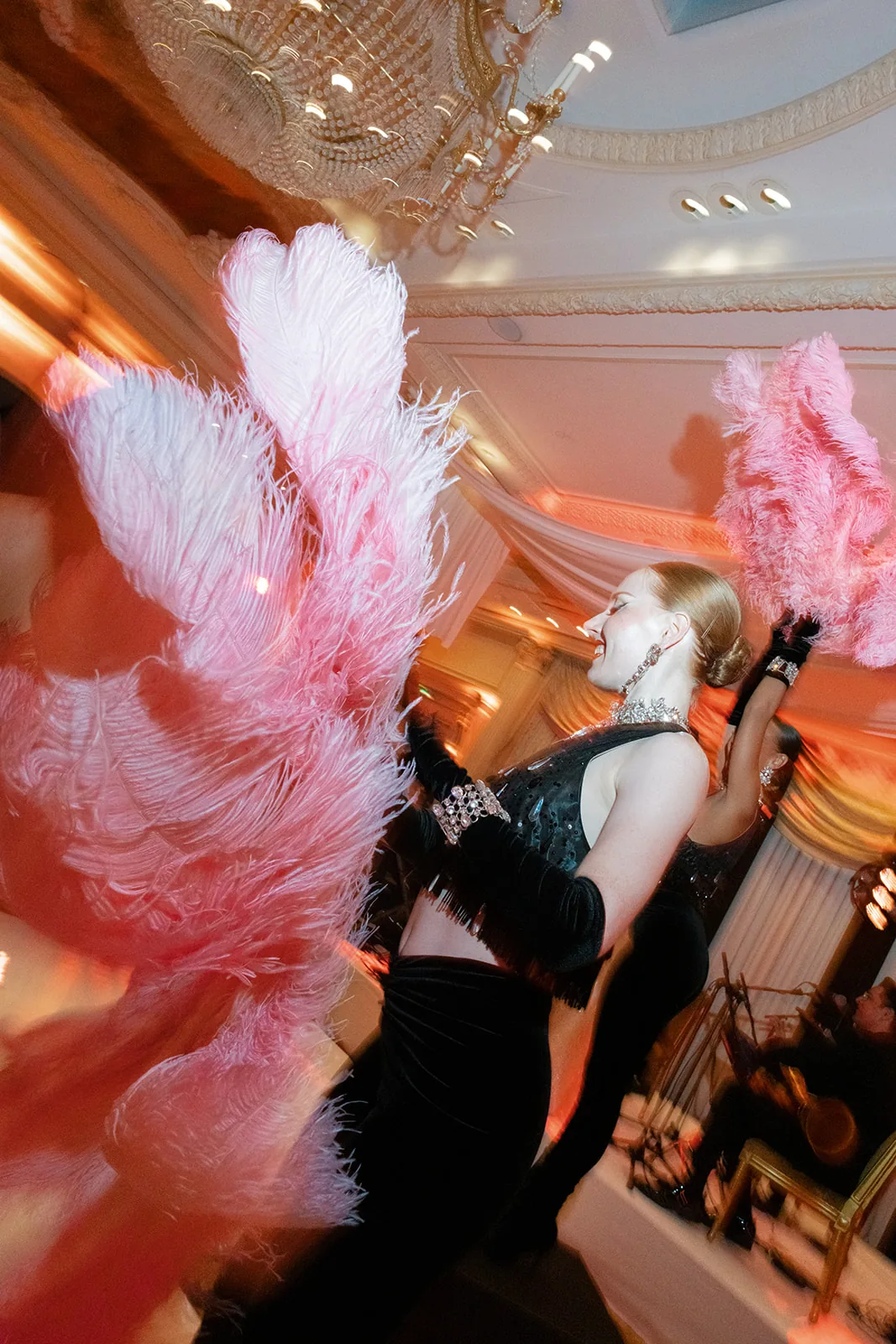 Pink feather dancers performing during a Shangri-La Paris wedding party