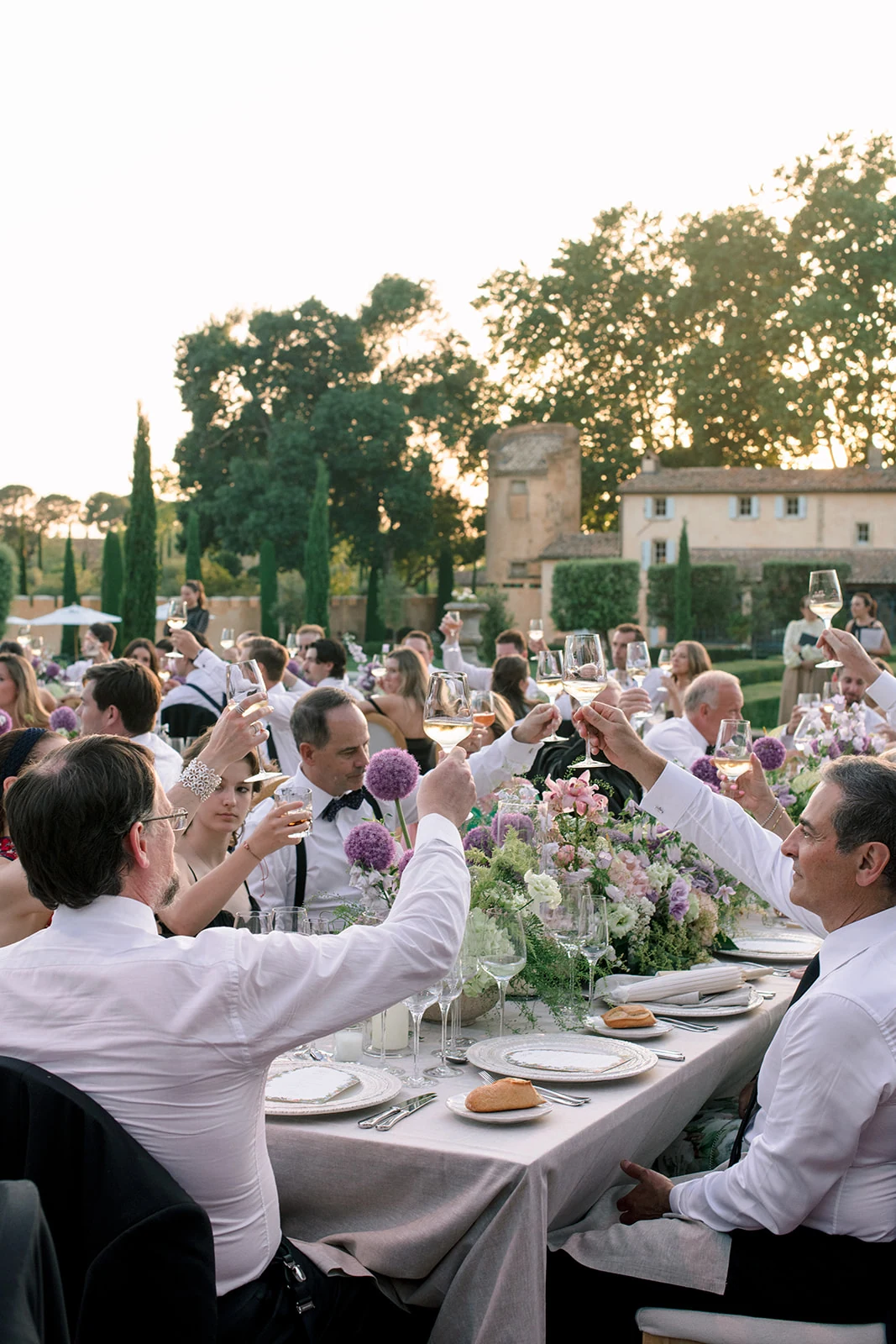 Wedding reception toast at Villa Baulieu in Provence