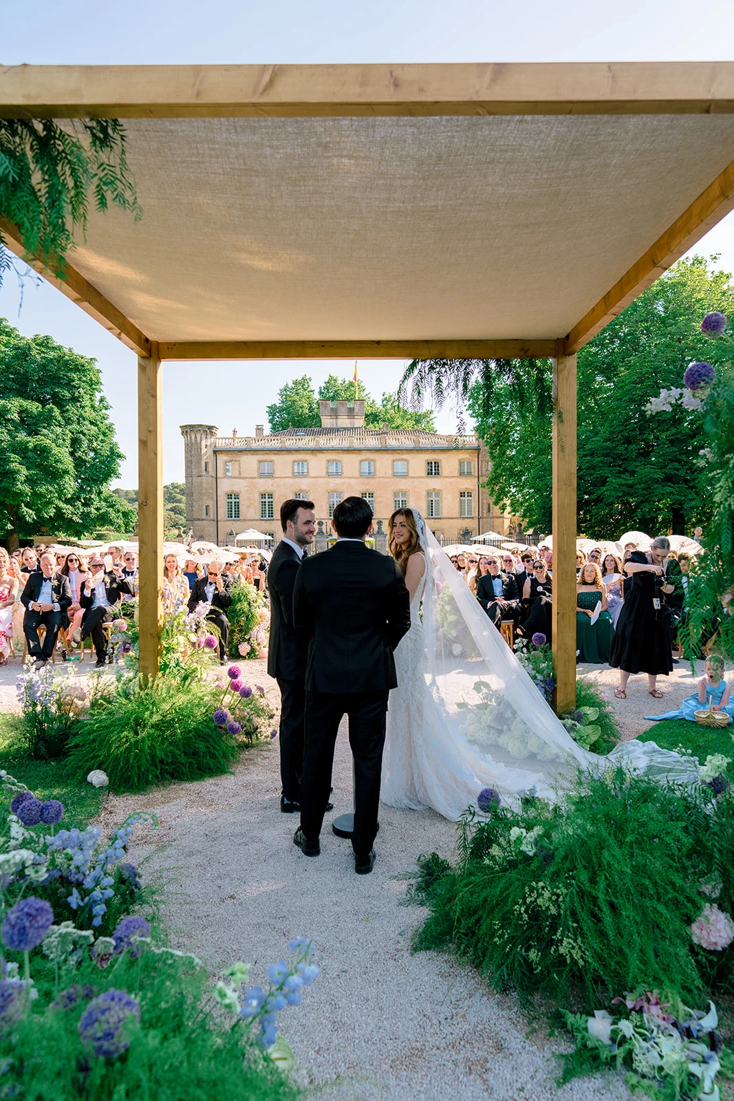 Bride and groom during their wedding ceremony at Villa Baulieu in Provence