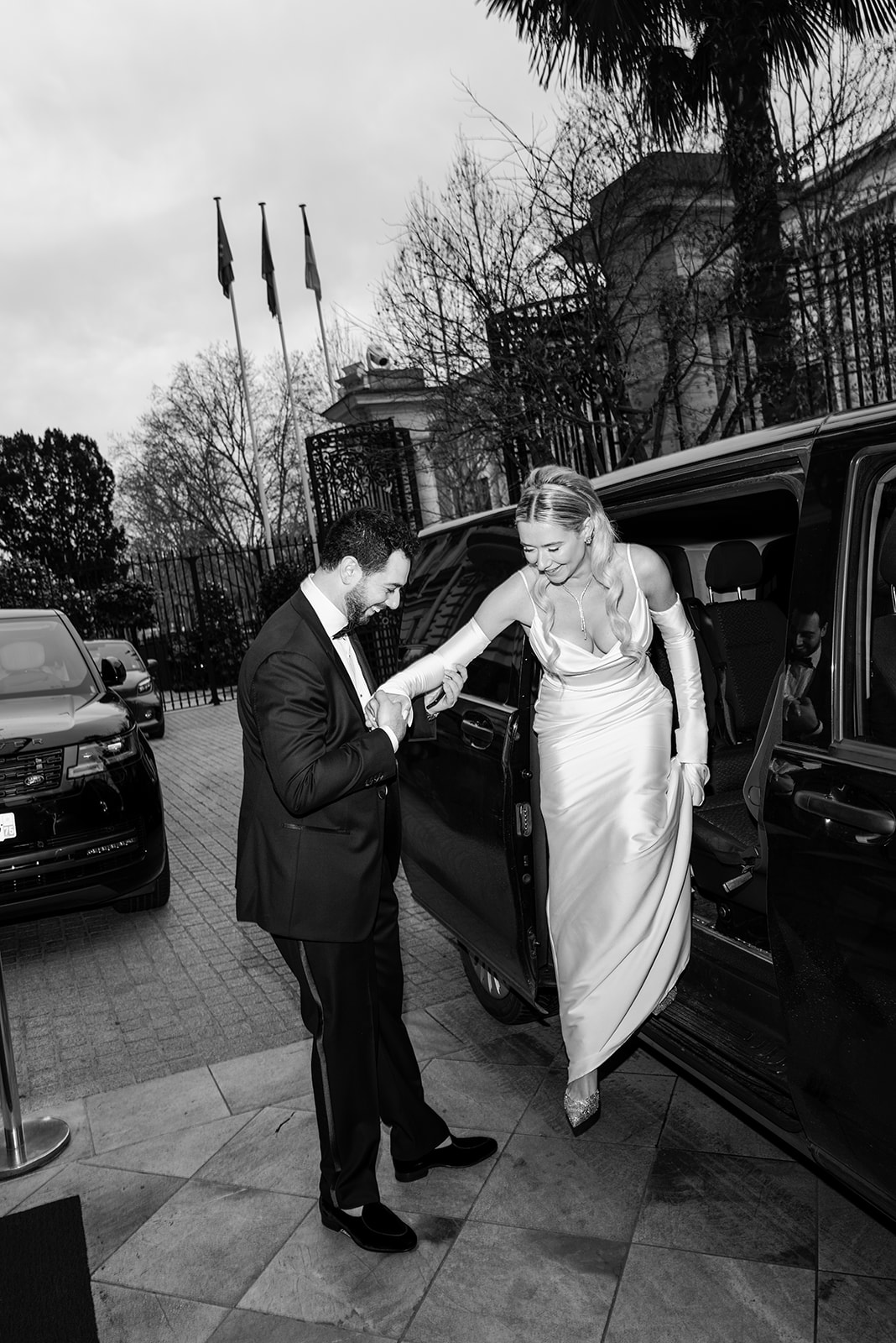 Bride and groom in black tie photographed inside Shangri-La Paris